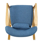 Fauteuil à bascule en bois massif avec coussin en lin et fabrication artisanale de qualité supérieure